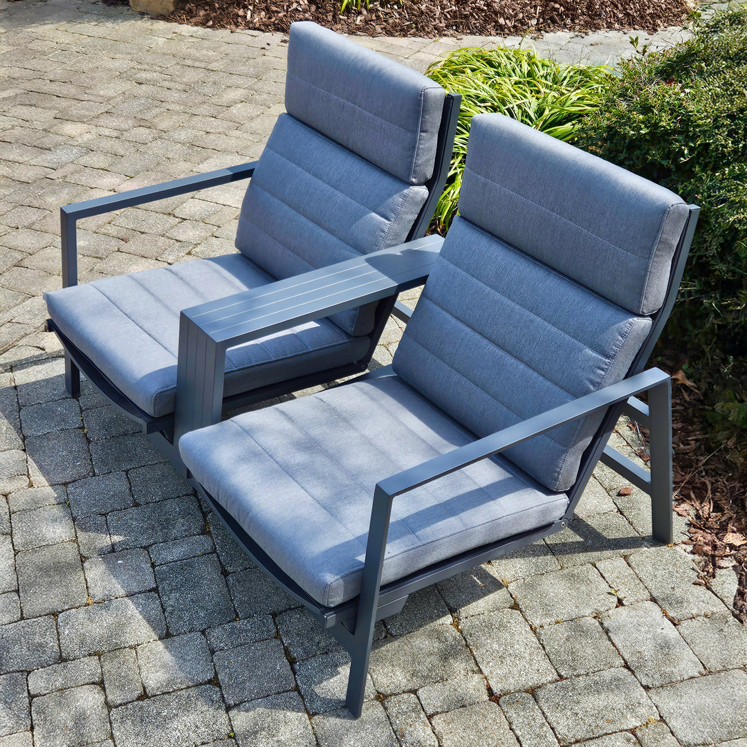 Bondi Tete A Tete Loveseat with gray cushions, aluminum frame, independent reclining seats, and in-between table outdoors.