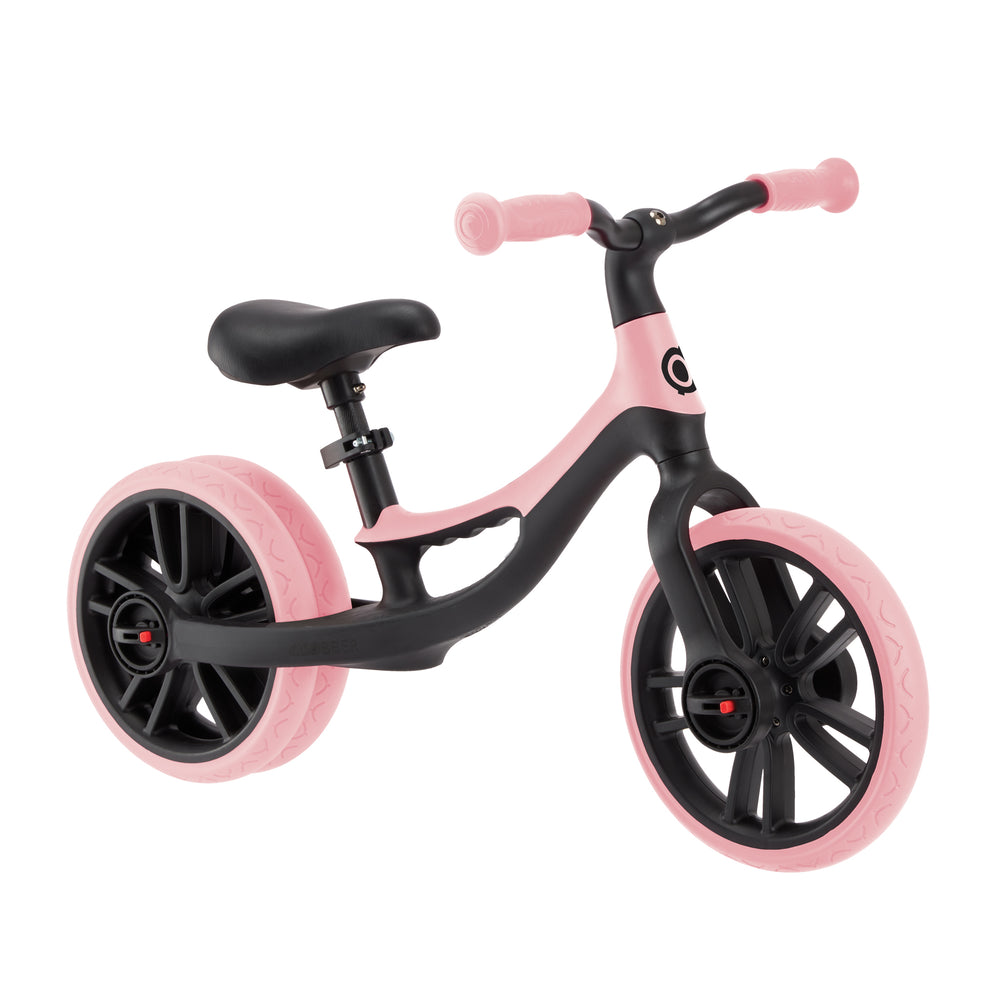 Go Bike Elite Duo Balance Bike in pastel pink with dual rear wheels and adjustable saddle for toddlers.