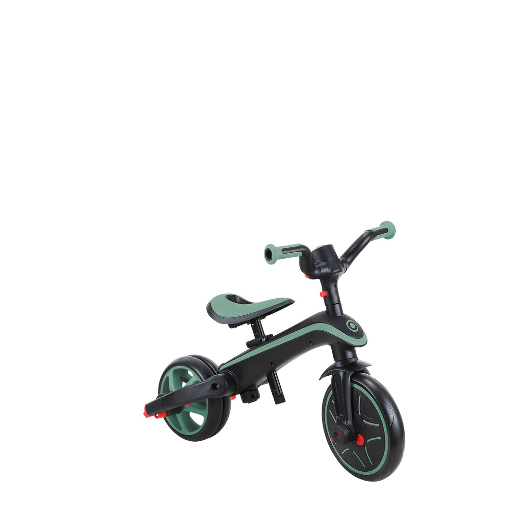 Explorer Trike Foldable 4-in-1 in black and green, shown as a balance bike for toddlers up to 5 years.