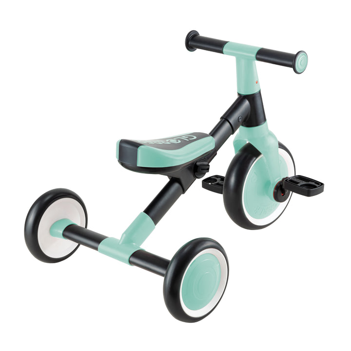 Learning Trike 2-in-1 in mint with metal frame, adjustable seat, and removable pedals for trike and bike modes