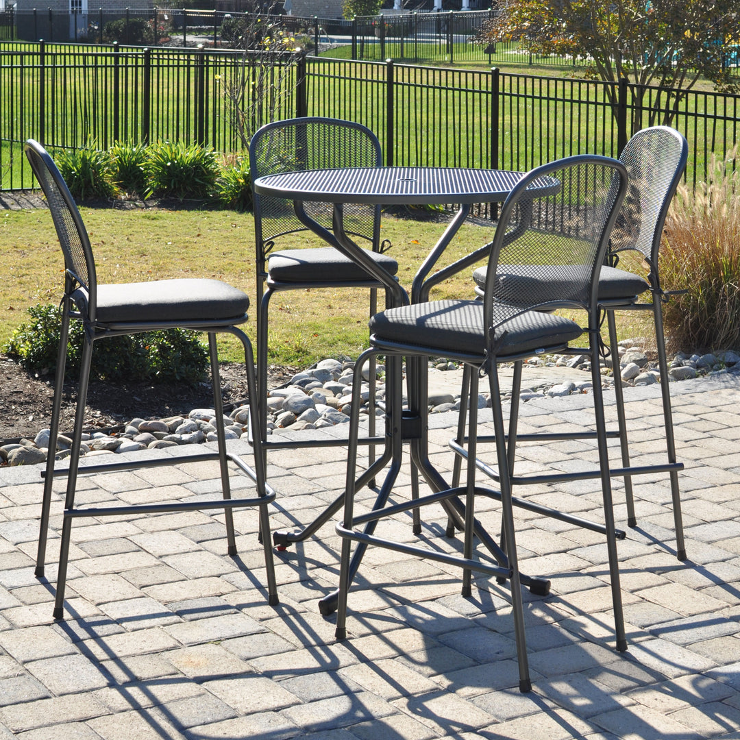 5-Piece Carlo Bar Set iron grey metal mesh bar table and four matching ergonomic bar chairs outdoors.