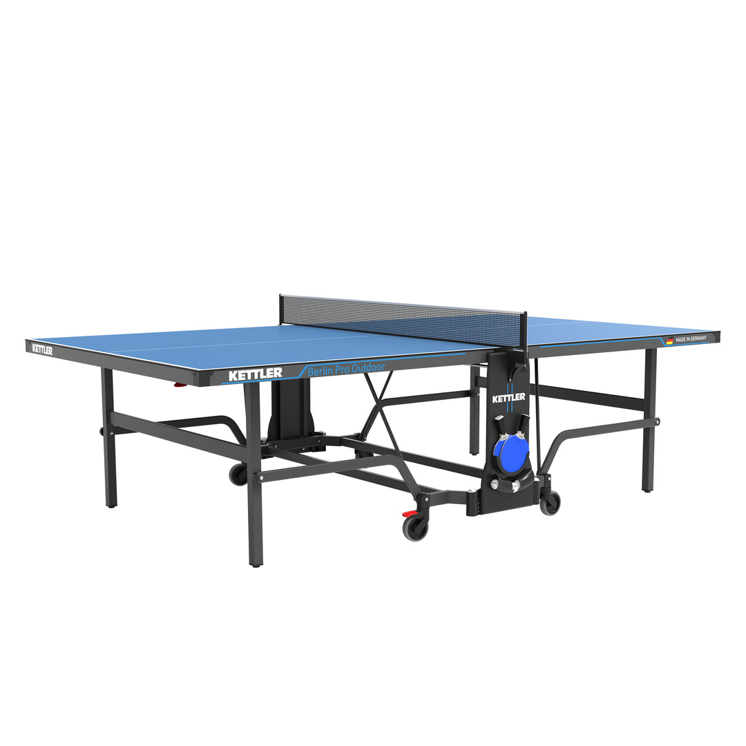 Berlin Pro Outdoor Table Tennis Table 4-Player Bundle with weatherproof surface, durable frame, net, rackets, balls, and storage cover.