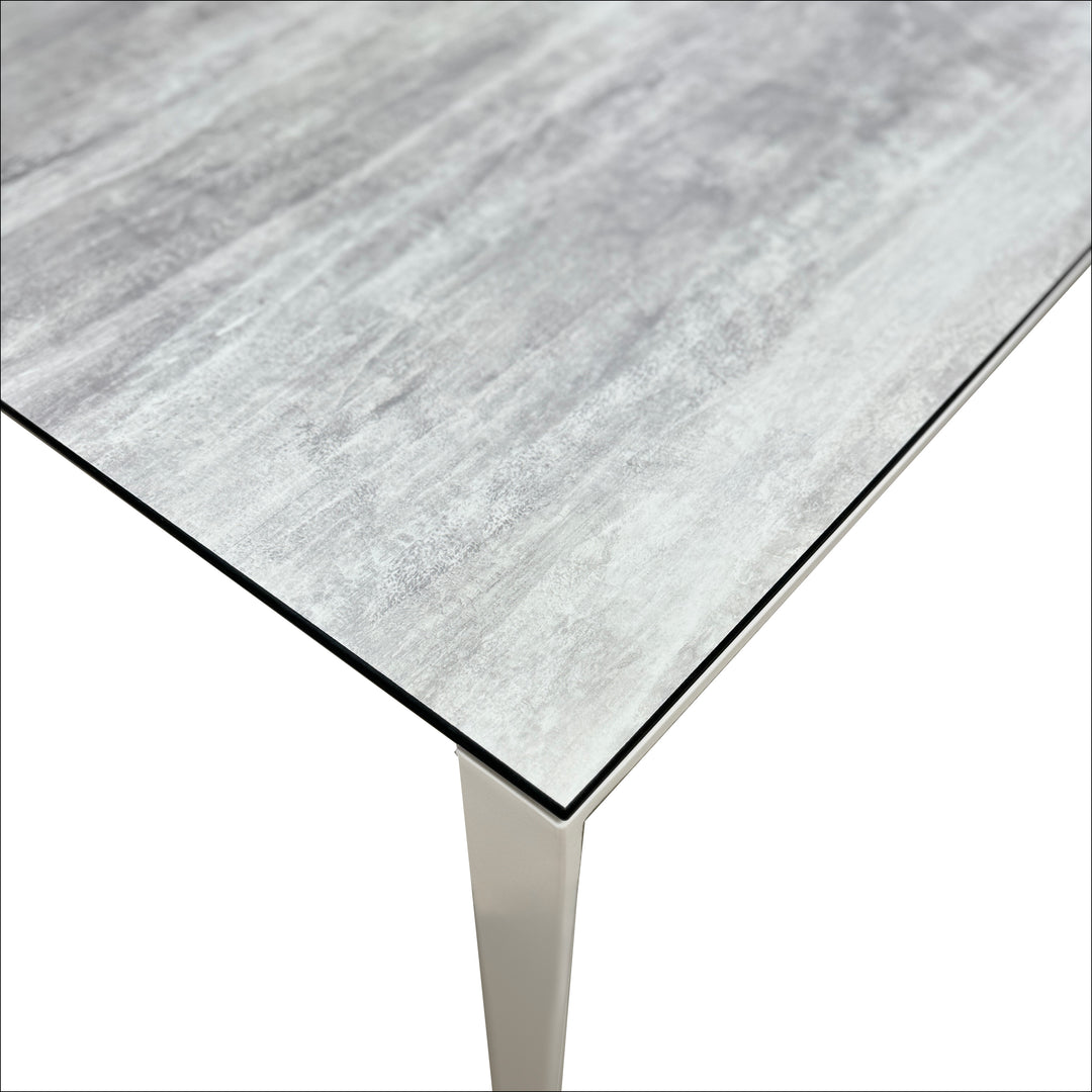 Tiffany 7 Piece Polytec® Dining Set with weather-resistant HPL tabletop and sturdy aluminum frame in moon top and white frame.