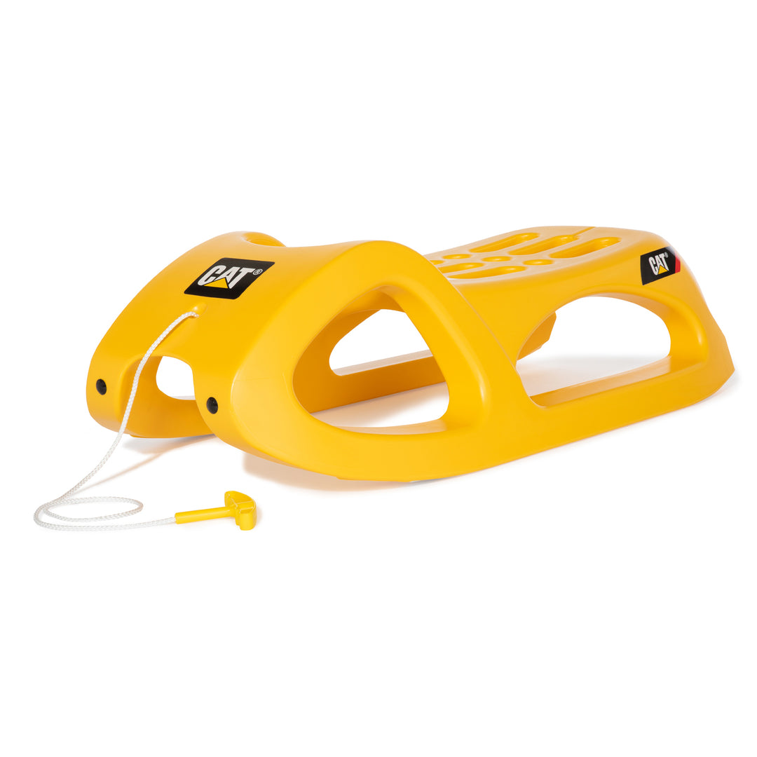 CAT Snow Cruiser Sled By Rolly Toys yellow durable resin sled with stainless steel runners and tow handle for easy transport.