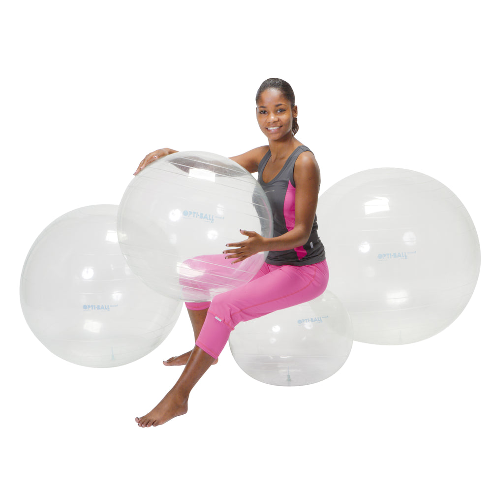 Woman using transparent Gymnic Opti Ball for core and balance exercises, showing patient movement during therapy.