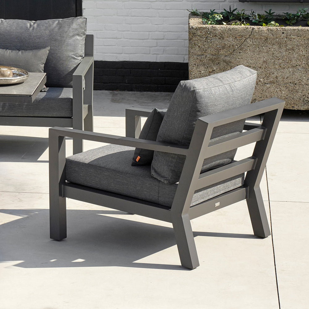 Timber Lounge Set with High Coffee Table featuring gray cushioned aluminum lounge chair outdoors on patio