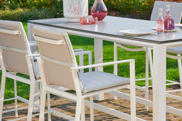 Primavera 5-Piece Bar Set - White outdoor bar table and chairs with white aluminum frames and ceramic tabletop