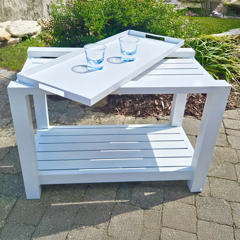 Easy Serving Trolley - Aluminum in white with removable tray and two glasses on top, outdoor patio setting.