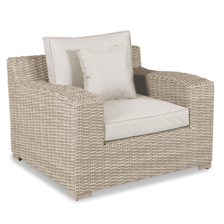 Palma Luxe Lounge Chair with handwoven Oyster Weave, weather resistant cushions, and teak feet with levelers.