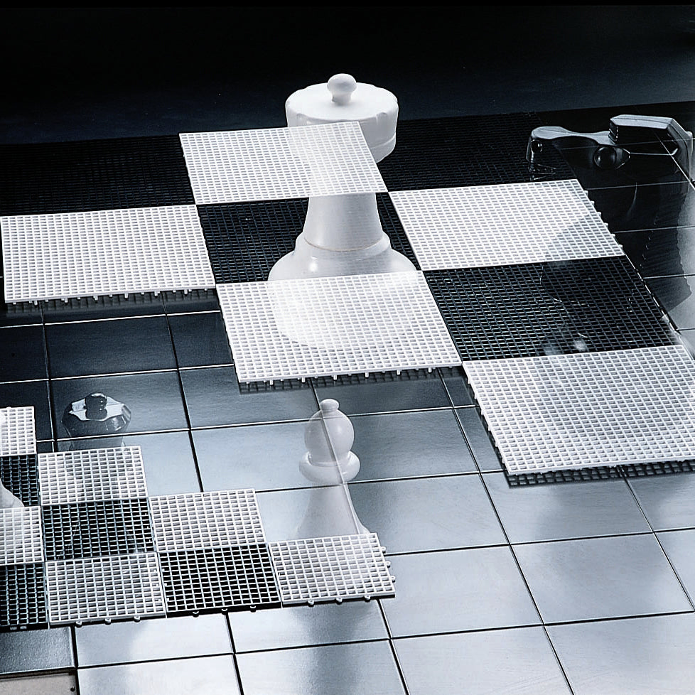 Giant 10x10 Tile Game Board with snap-together black and white pieces for oversized chess or checkers play.