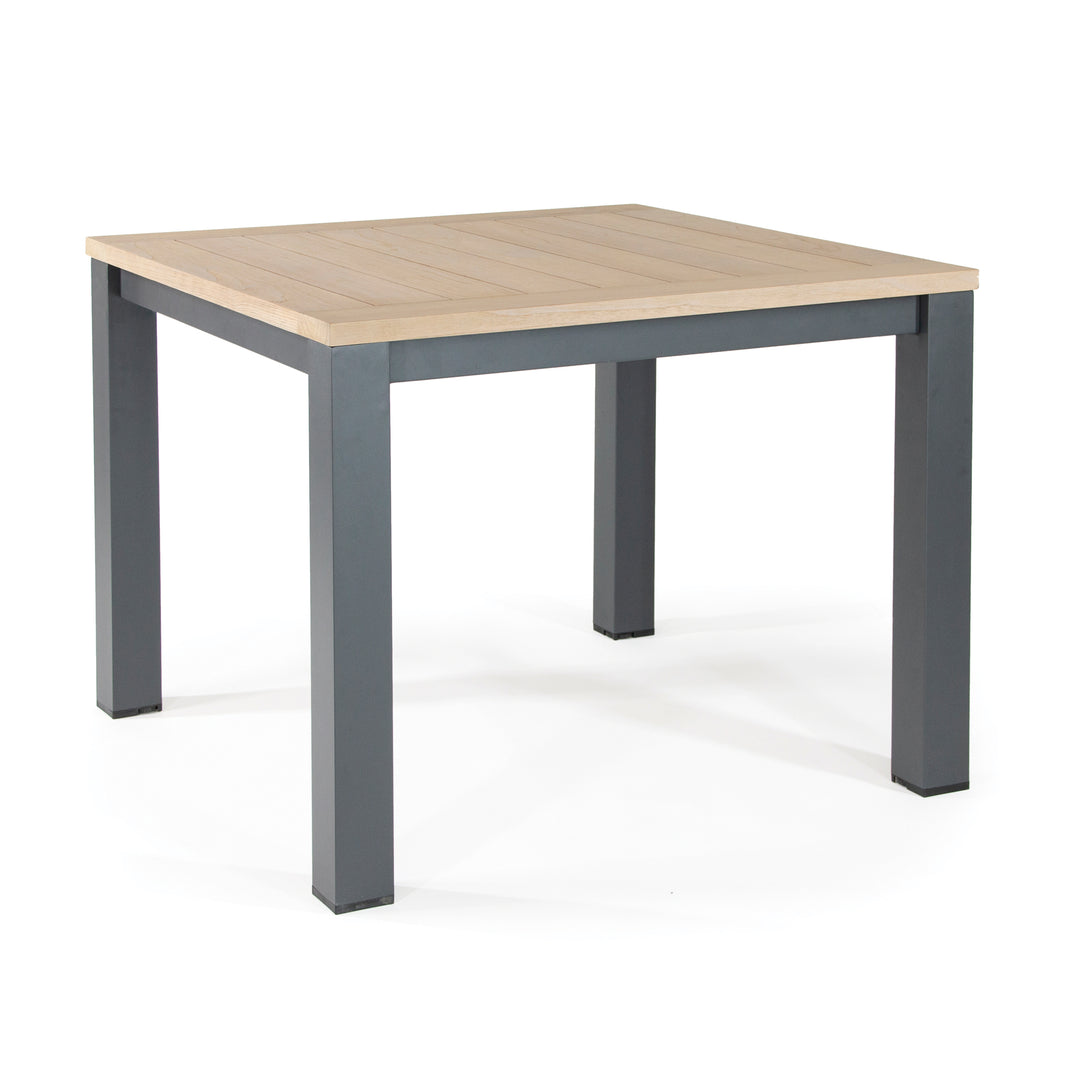 40-inch Elba Dining Table With Teak Top featuring a charcoal aluminum frame and solid teak wooden surface.