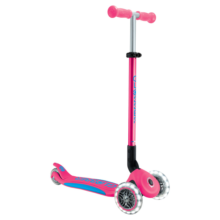Elite Scooter in fuchsia with LED front wheels, adjustable T-bar, and patented folding system for kids 3 to 9 years.