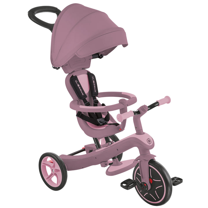 Explorer Trike Eco 4-in-1 in berry color with adjustable canopy, safety harness, and ergonomic handles for toddlers.