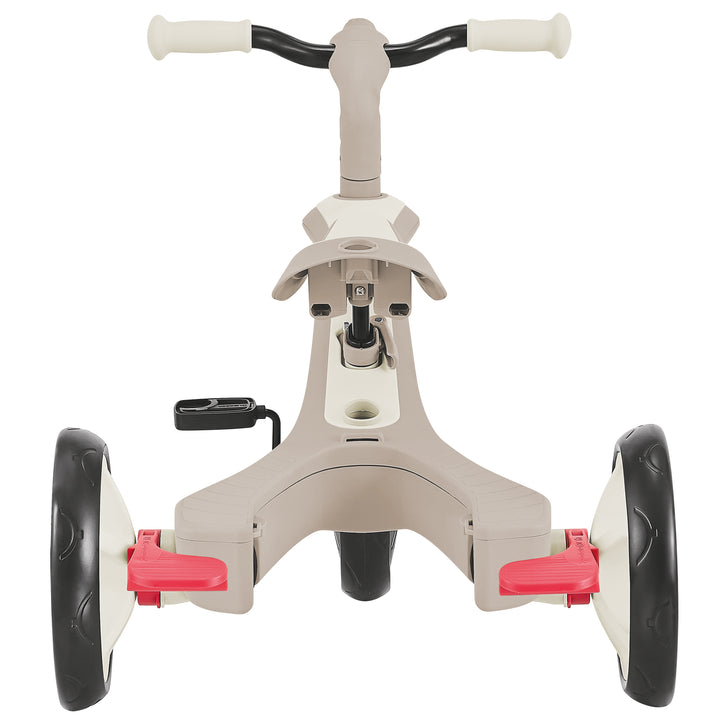 Explorer Trike Eco 4-in-1 beige and black toddler tricycle with red pedals and sturdy EVA foam wheels.