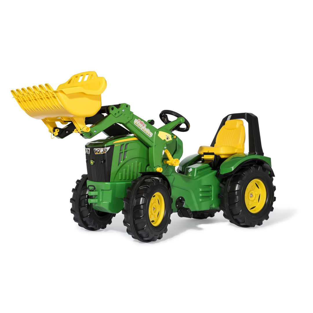 John Deere Premium X-Trac with Loader toy tractor featuring a yellow loader, adjustable seat, and rugged tires.