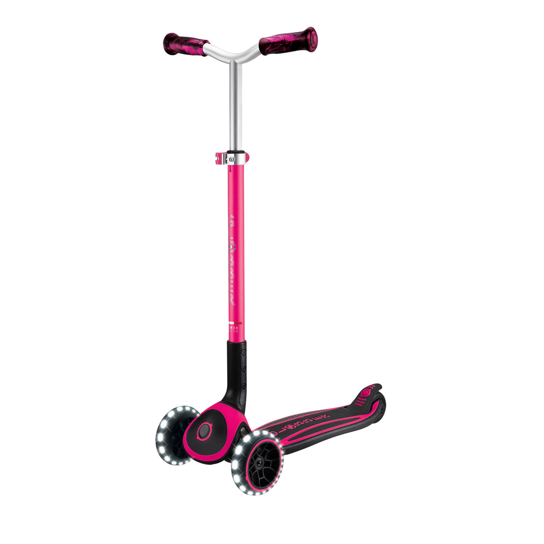 Ace Scooter in fuchsia with 3 wheels, LED light-up, adjustable T-bar, wide deck, and folding trolley system.