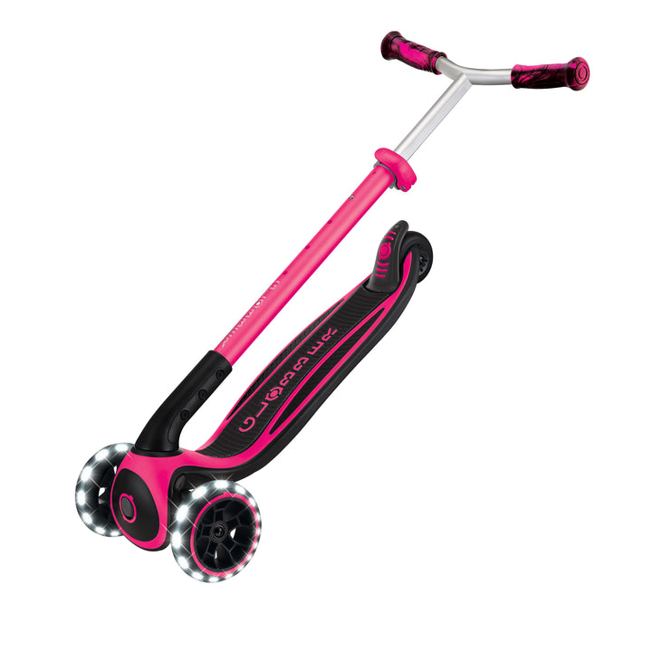 Ace Scooter in fuchsia with three LED light-up wheels, adjustable T-bar, and wide deck for kids and adults.