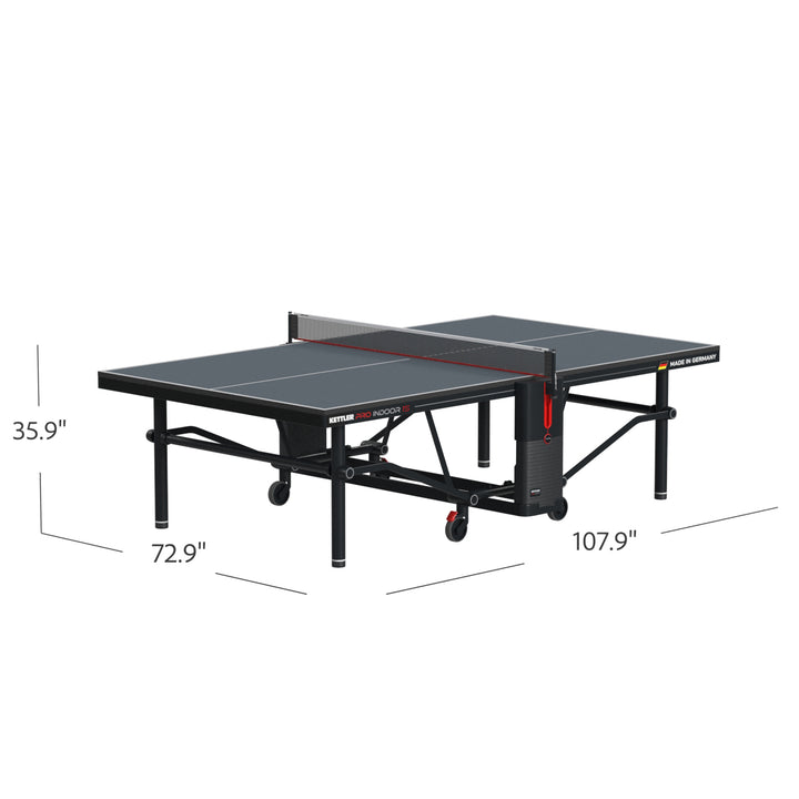 KETTLER Pro Indoor 15 Table Tennis Table with sturdy steel frame, IN-TEC22 top, centerfold design, and wheels for easy transport.