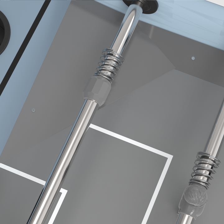 STAG Atmos Outdoor Foosball Table close up showing polished metal rods and coiled springs over the marked gray playing surface