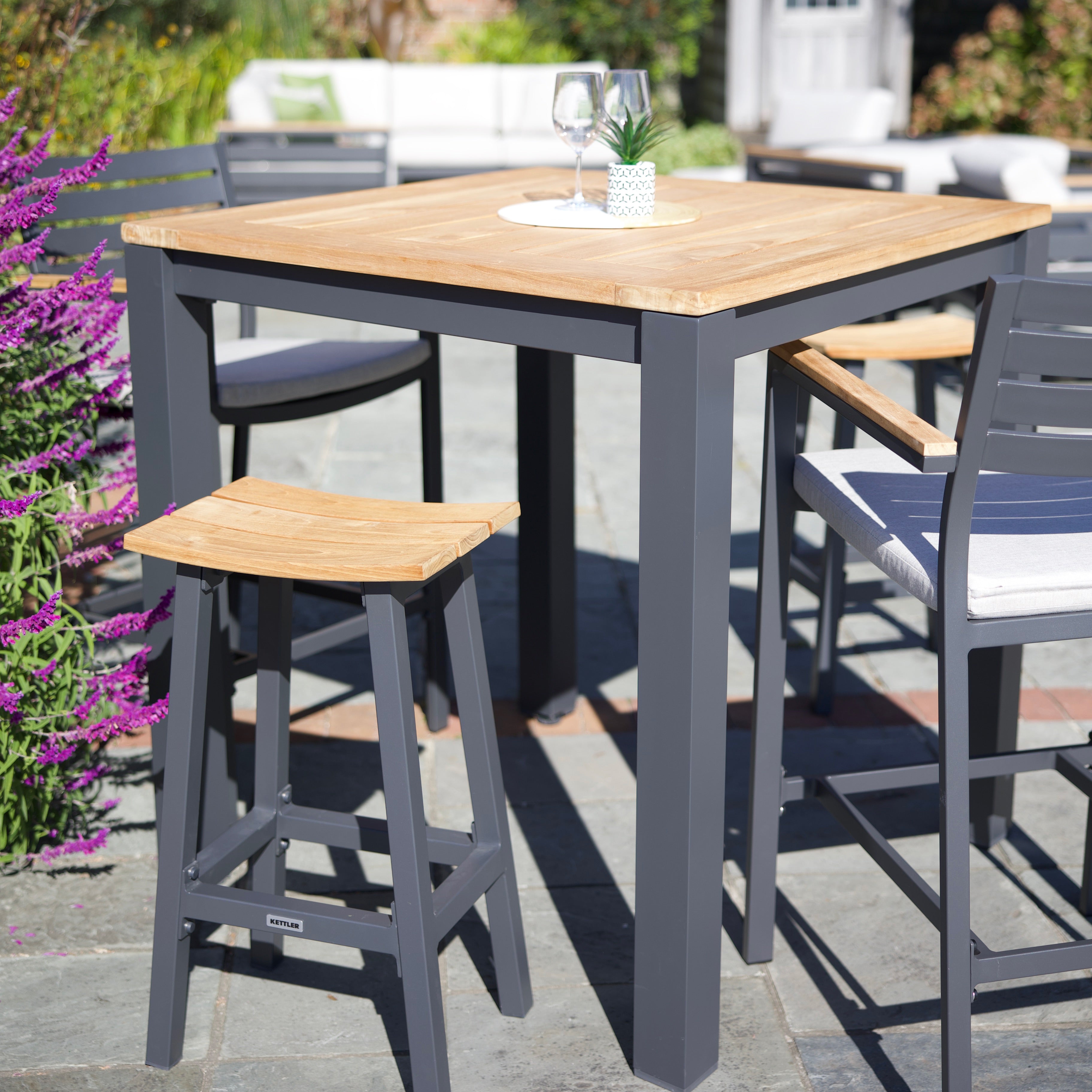 40" X 40" Elba Aluminum Bar Table With Teak Top lifestyle with chairs 2