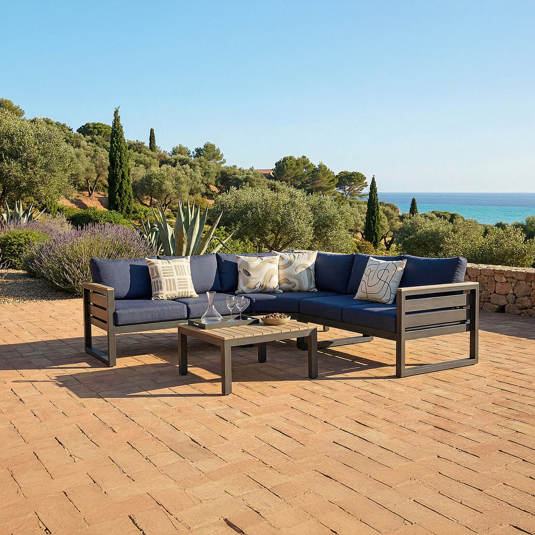 Elba Comfort Corner Lounge Set with Spectrum Indigo cushions on a coastal outside patio