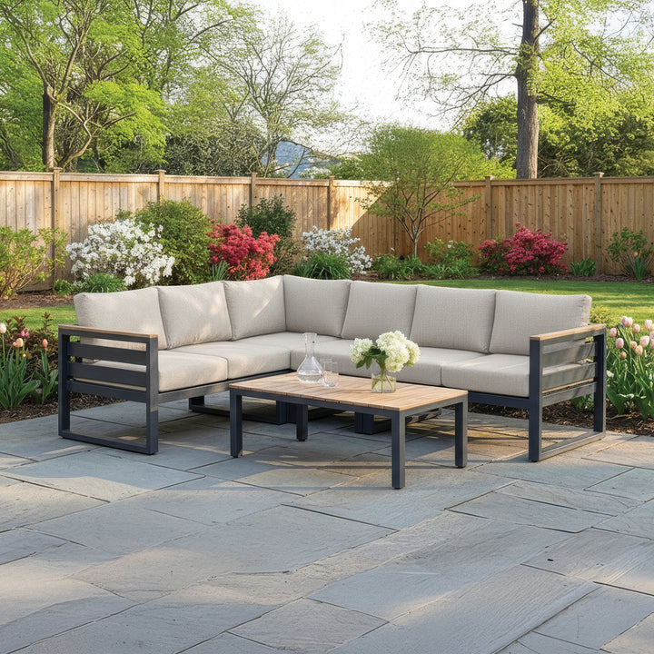 Elba Comfort Corner Lounge Set with Cast Silver cushions in a backyard patio