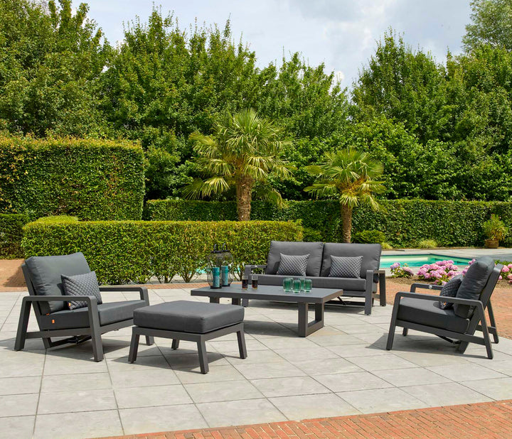 Boston Select Lounge Ottoman in charcoal with sturdy powder-coated aluminum frame on outdoor patio setting.