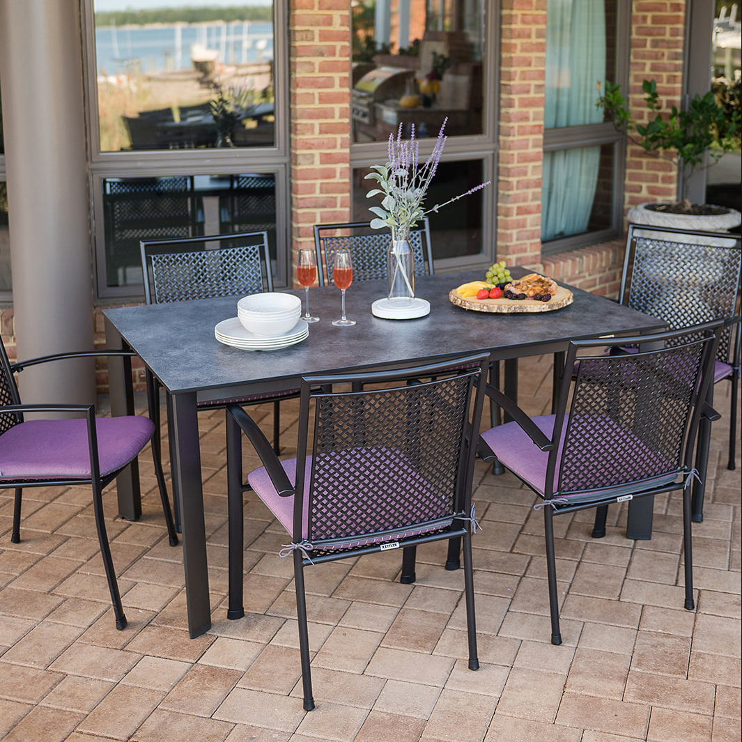 Reno 7-Piece Dining Set with High Pressure Laminate one-piece table top that resists scratching & chipping and has Unique 3-layer construction makes it one of the most durable surfaces on the market