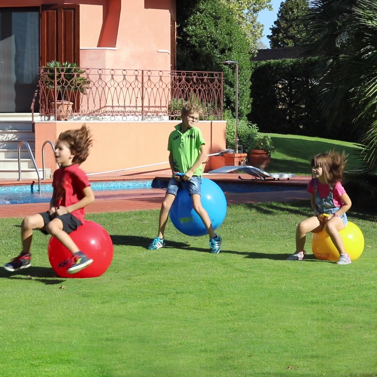 Children playing on the Hop balls