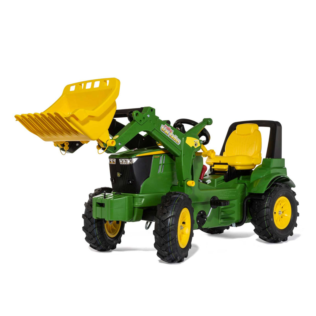 John Deere Farm Tractor with Air Tires pedal tractor for kids with adjustable seat and front loader attachment.