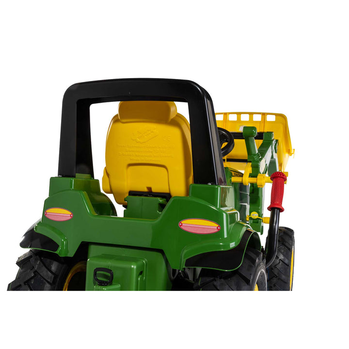 John Deere Farm Tractor with Air Tires pedal tractor rear view featuring adjustable yellow seat and loader attachment.