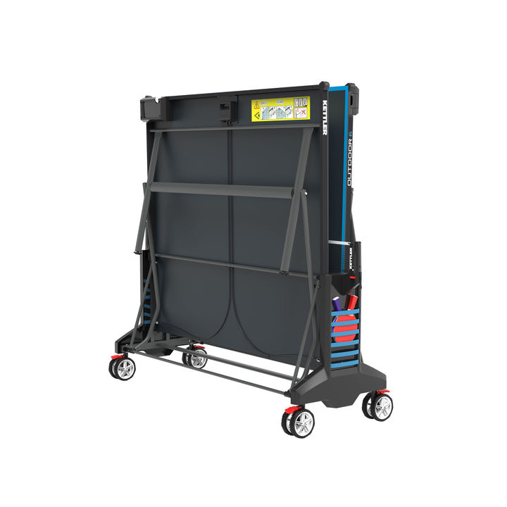 Folded frame and wheels of the Outdoor 6 Table Tennis 4-Player Bundle with paddles and balls storage.