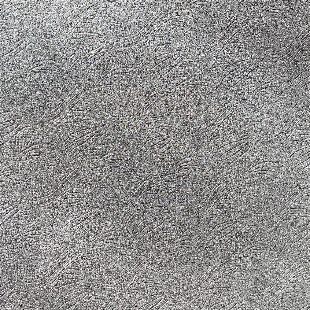 Closeup of the pattern that is impressed into the surface of the top of the mat.