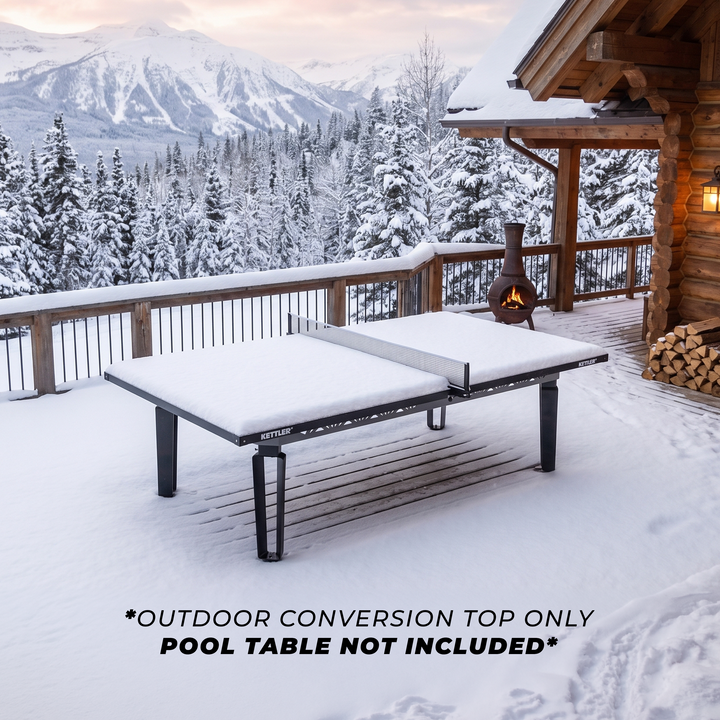 KETTLER Outdoor Conversion Top covering an outdoor table on a snow covered deck with mountain views