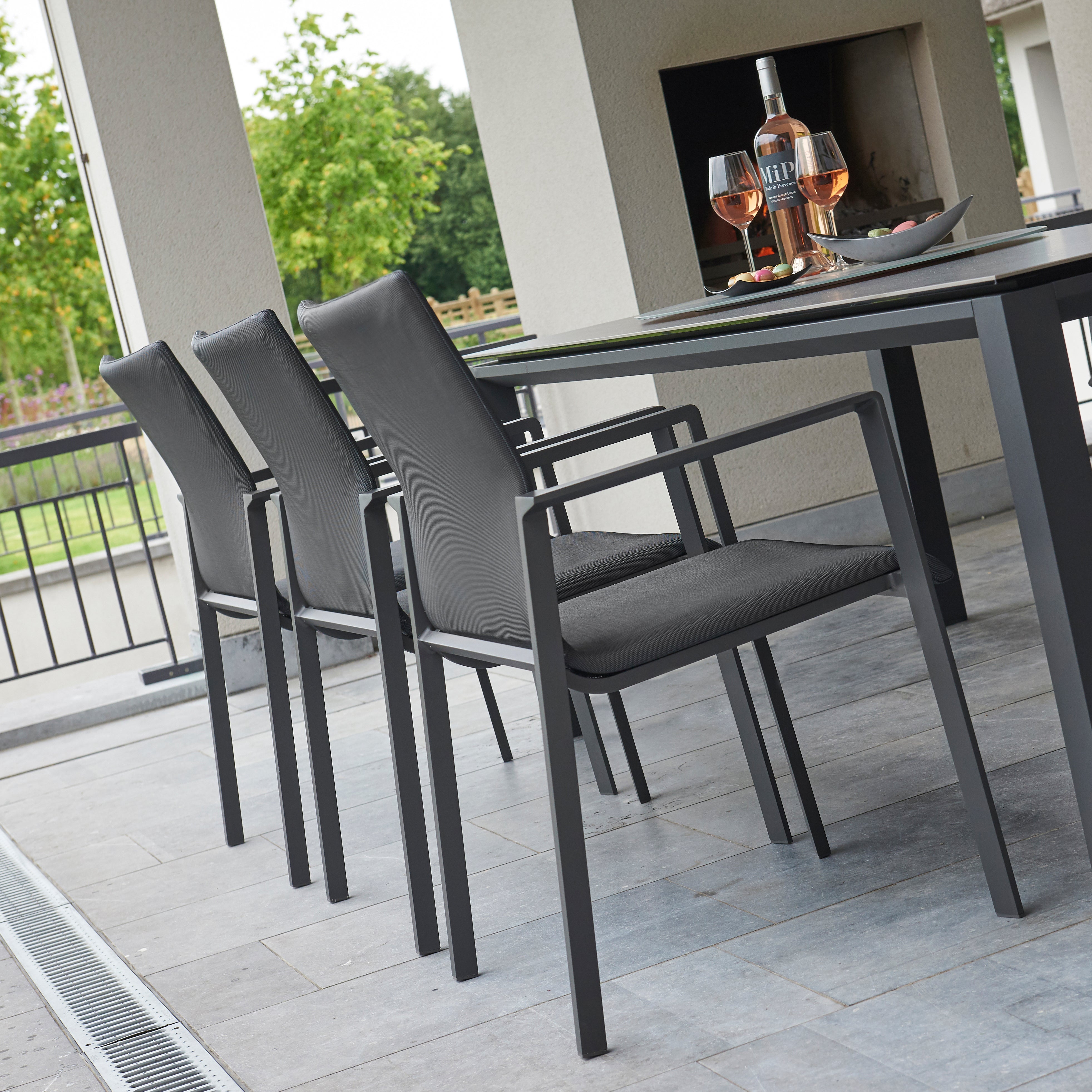 Dine alfresco in style with the Sense Dining Set. The sleek profile of the table and chairs give a clean, contemporary look. The dining chairs feature an aluminum frame with ergonomic arm rests and a comfortable all-weather sling with quick dry foam filling and all weather upholstery fabric. The ceramic top aluminum table is sturdy and weather resistant, ensuring years of outdoor dining enjoyment.