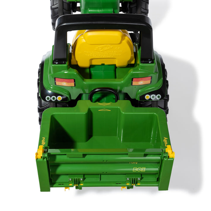 HaulBox Accessory for Tractors attached to green toy tractor with tiltable transport bed and detachable tailgate.