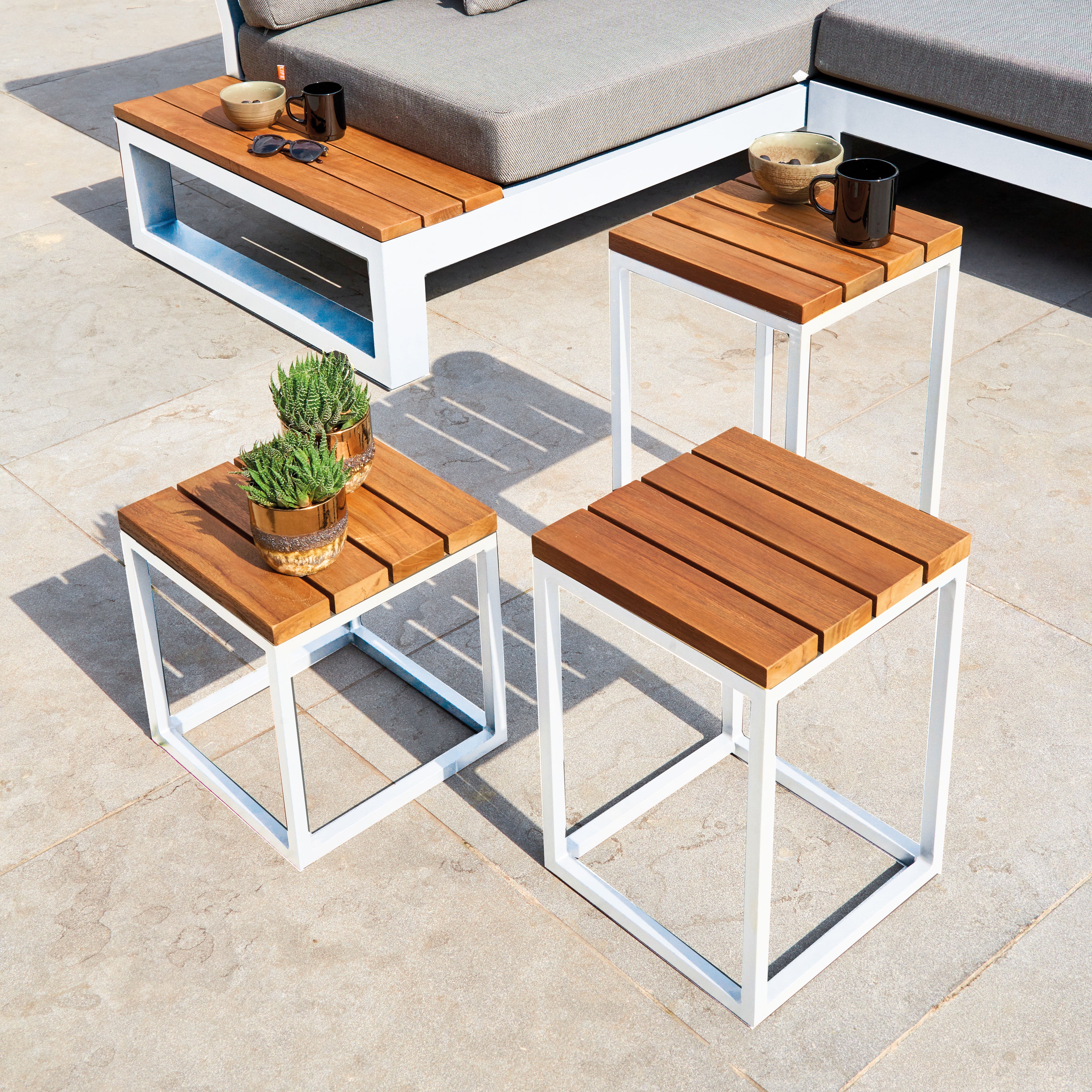 Add more functional dining and entertaining space with the Gili aluminum and FSC Certified teak coffee table and side tables. This versatile collection can accommodate any outdoor space from an intimate balcony area to a more spacious patio or deck.