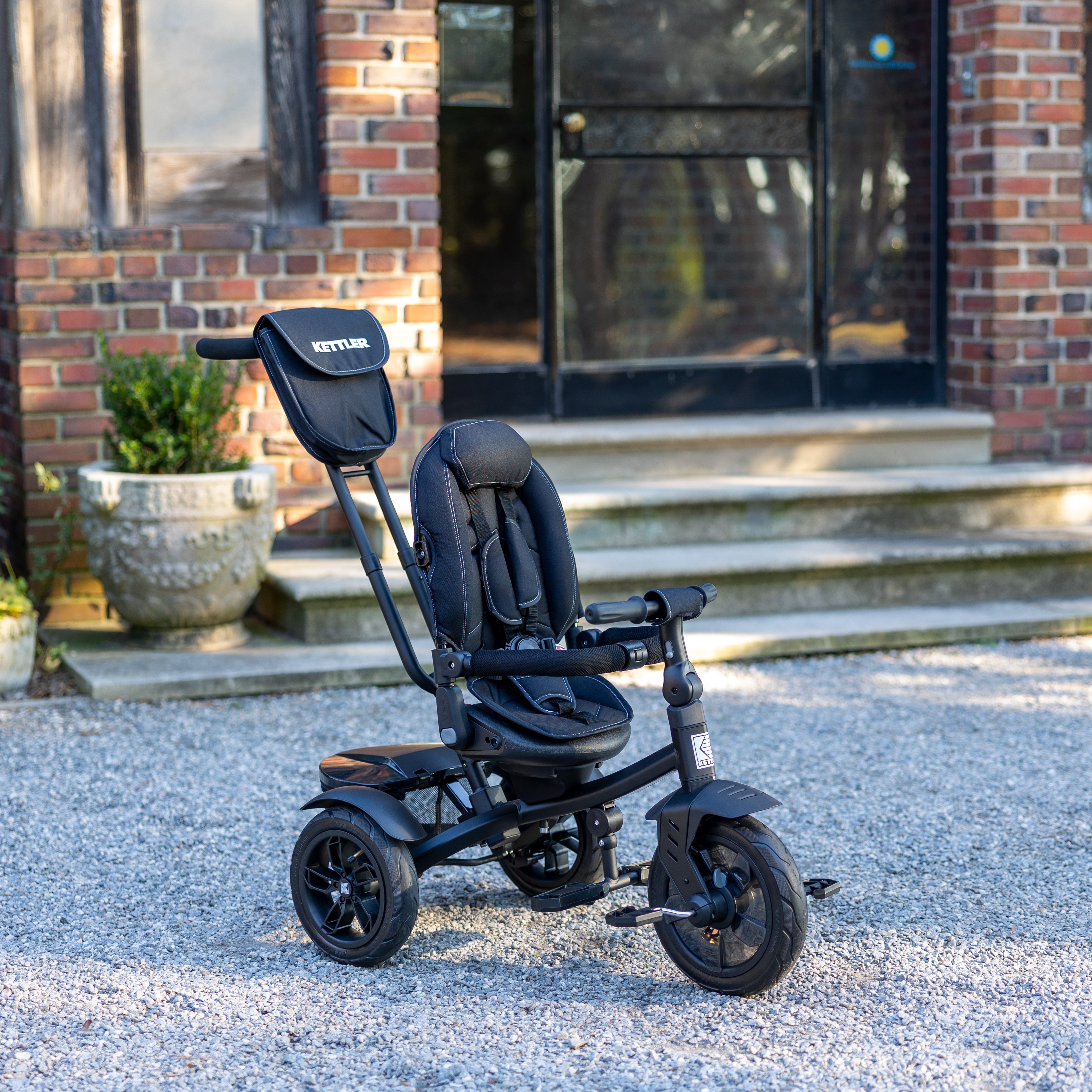 The KETTLER Air Navigator 6 in 1 Trike's function grows with your kids from 10 to 72 months. It features a rotating and reclining seat with a removable footrest and a 5-point safety harness to keep your little one safe.  You can put diapers or toys in the push bar bag and also large rear basket. The adjustable telescopic parent handle, foot brake and freewheeling function allow you to easily steer and control in the parent mode.