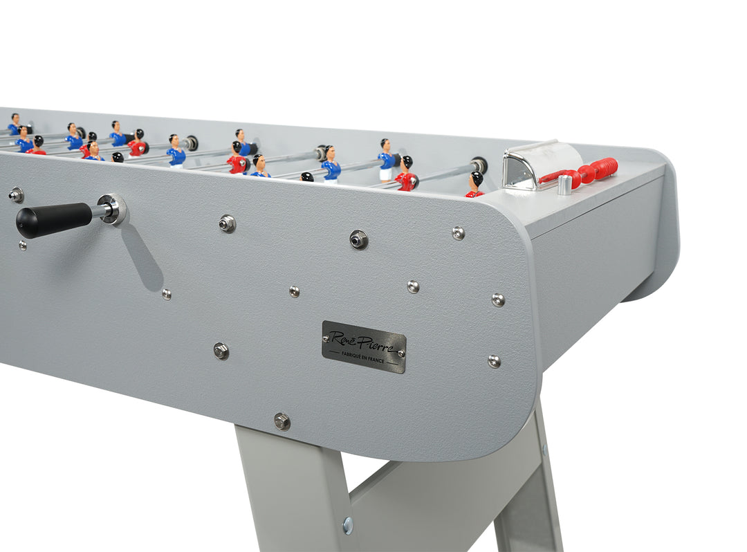 René Pierre Tahiti Outdoor Six-Player Foosball Table in gray with hand-painted players and ergonomic handles.