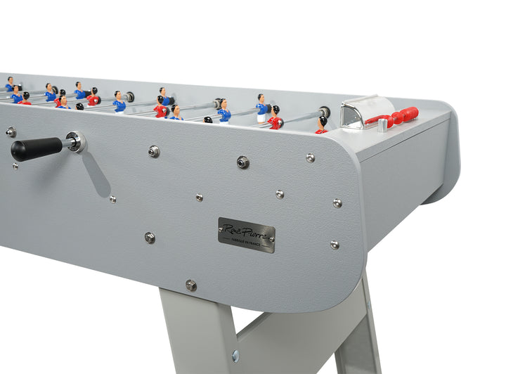 René Pierre Tahiti Outdoor Six-Player Foosball Table in gray with hand-painted players and ergonomic handles.
