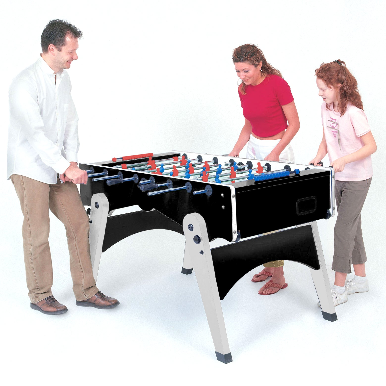 Family playing on the FOLDY Evolution Indoor Foosball Table