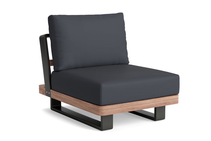 Fitz Roy Teak Armless Chair with lava aluminum frame, teak accents, and charcoal cushions for stylish outdoor seating.