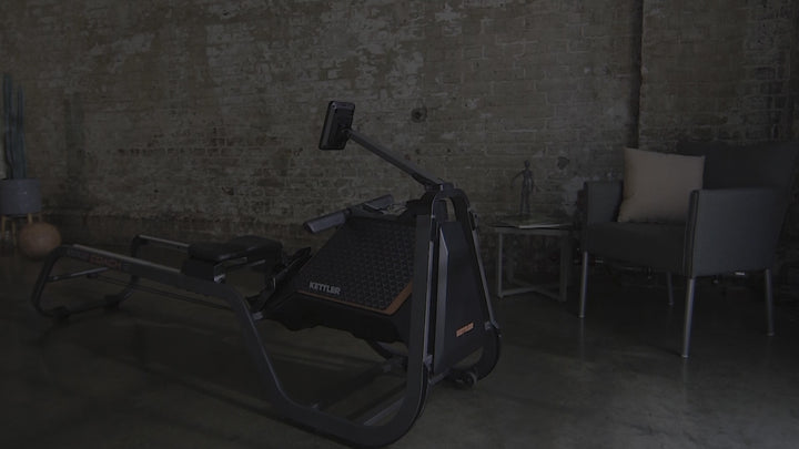 Girl working out on a Coach 2 Rowing Machine