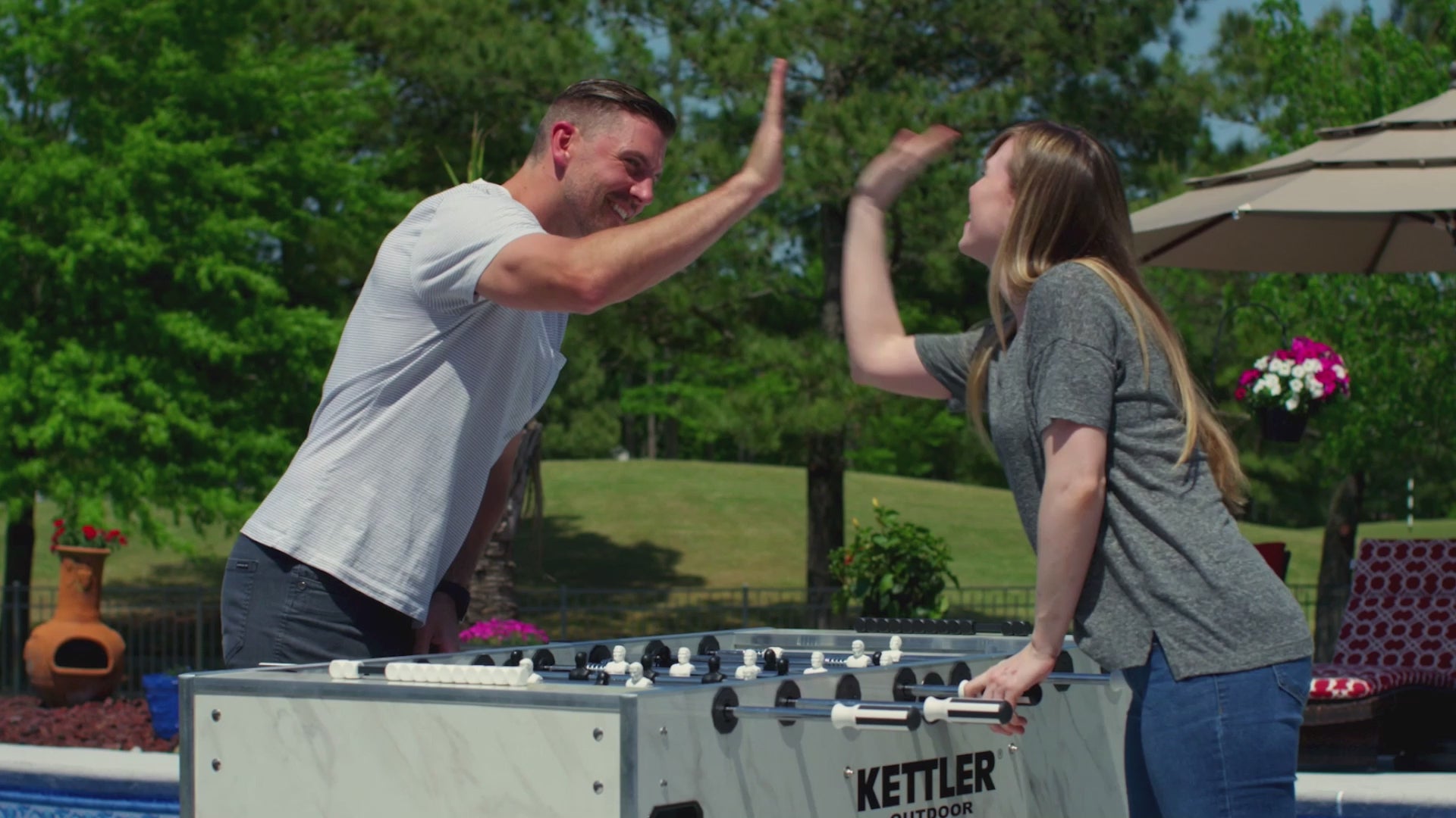 KETTLER CARRARA FOOSBALL TABLE VIDEO OF PLAYERS PLAYING INDOORS.