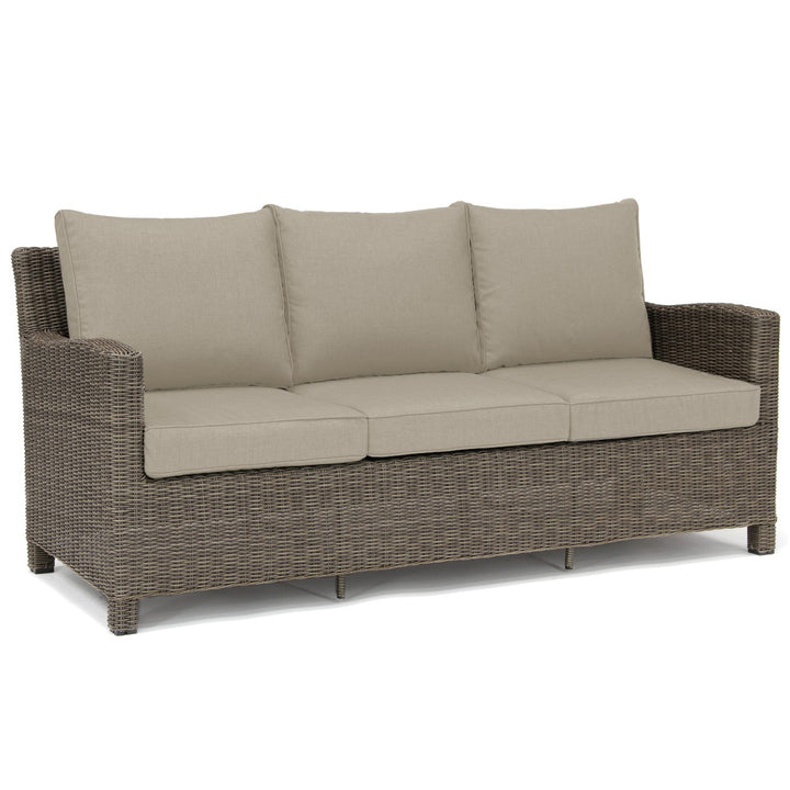Palma Wicker Rattan Sofa with beige Cushions, handwoven weatherproof rattan and durable aluminum frame for indoor or outdoor use.