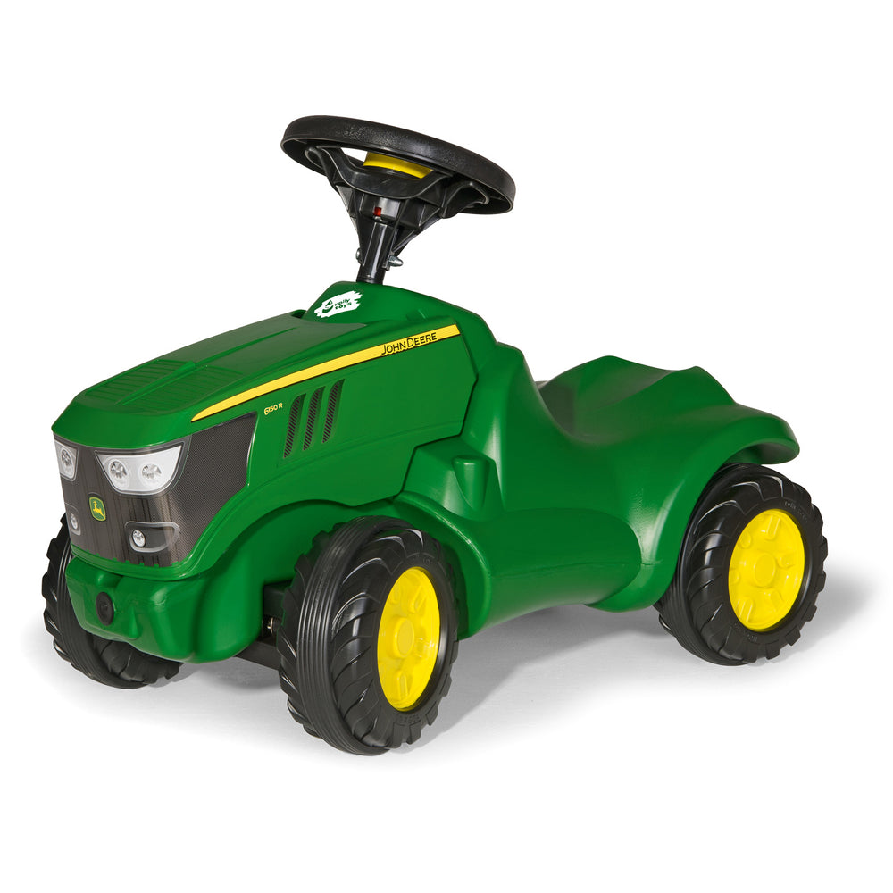 John Deere Minitrac Foot To Floor Ride-On for toddlers with durable body, squeaky horn, and comfortable knee indention.