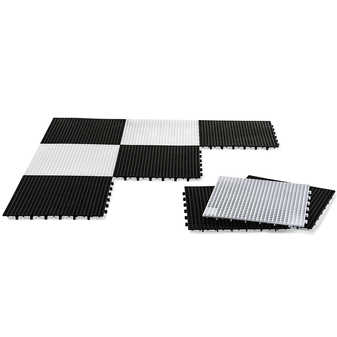 Mini-Giant 48x48-inch Tile Game Board showing interlocking black and white resin tiles for chess or checkers.