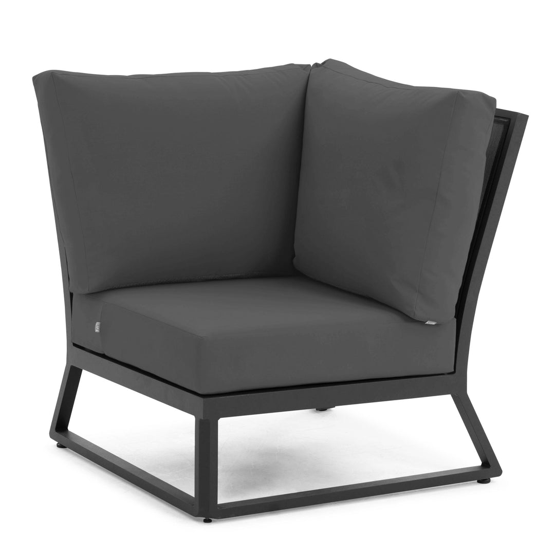 Montana Corner Chair with sturdy teak, lightweight aluminum frame, charcoal Sunbrella cushions, and modern outdoor design.