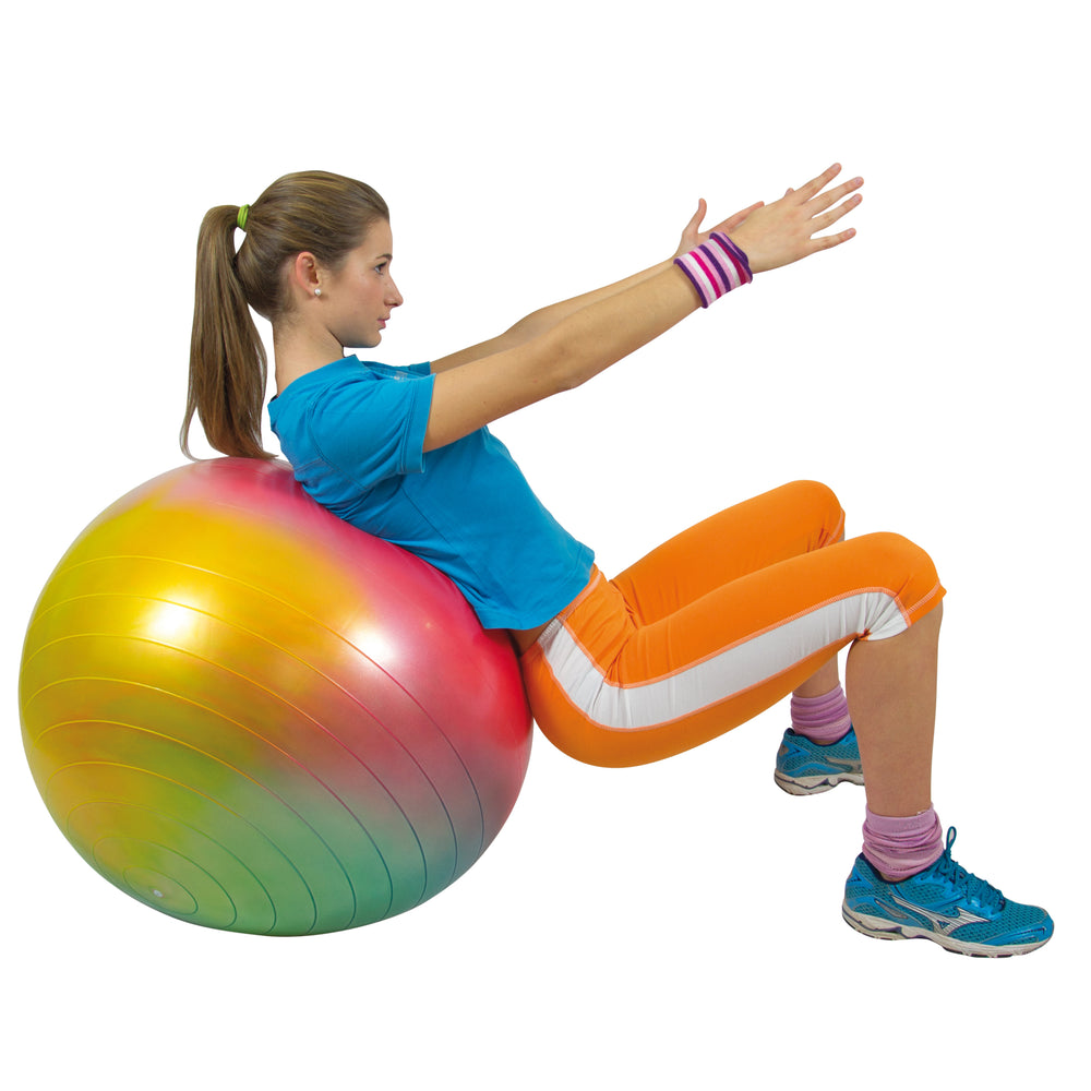 Woman exercising with a colorful Gymnic Arte BRQ Physiotherapy & Fitness Ball for core and balance training.