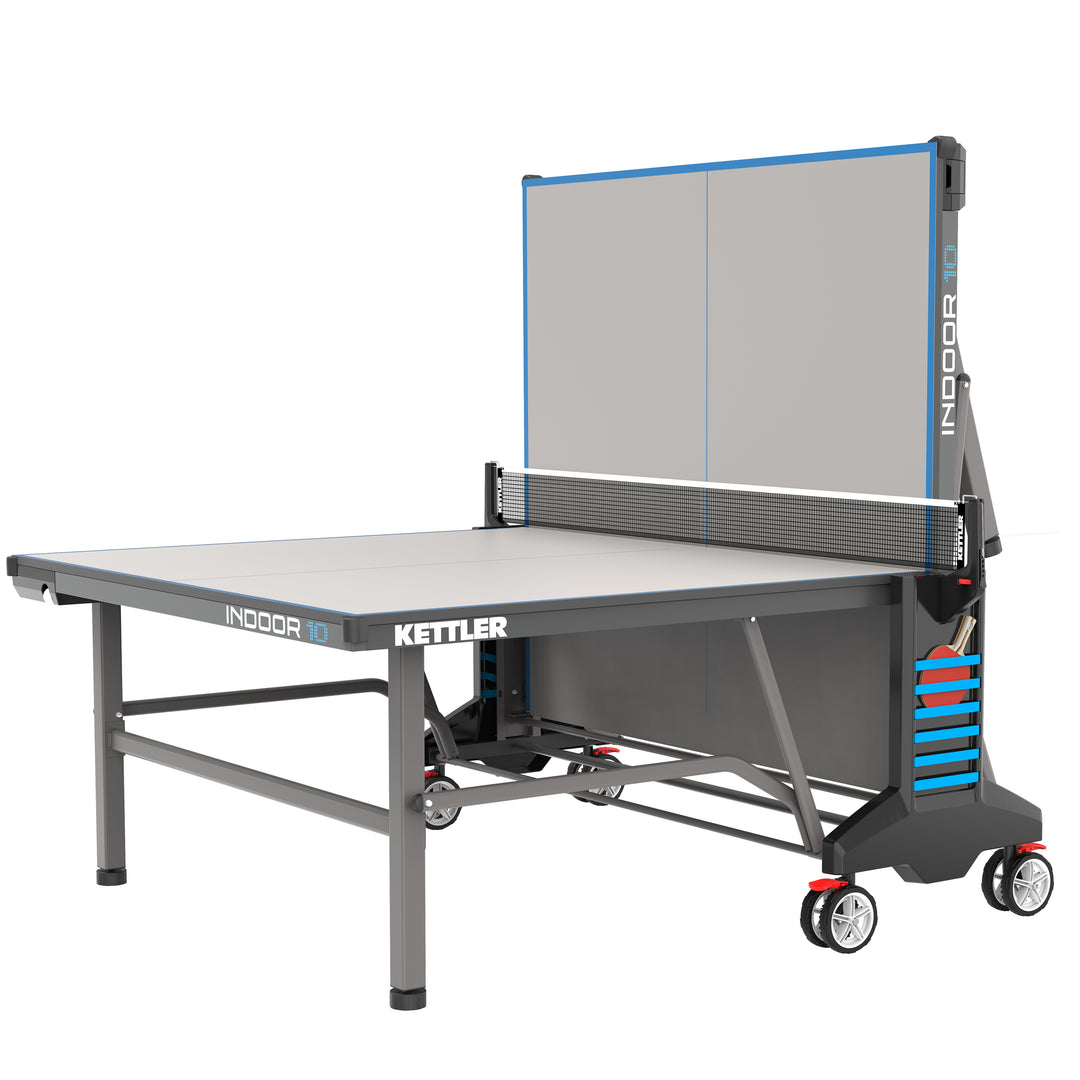 Indoor 10 Table Tennis Table by KETTLER with IN-TEC25 surface, permanent net, folding design, and large transport wheels